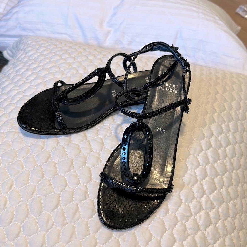 Stuart Weitzman black patent strappy sandals in original box.